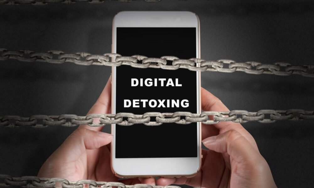 person putting phone away relaxing digital detox concept india
