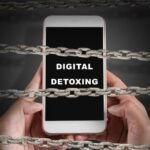 person putting phone away relaxing digital detox concept india