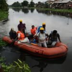 Health workers conducting seasonal disease prevention awareness activities in India.