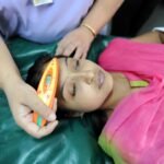 Doctors attending patients with seasonal viral infections in an Indian hospital