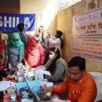 Doctors conducting community health screening and medical check-ups in India.