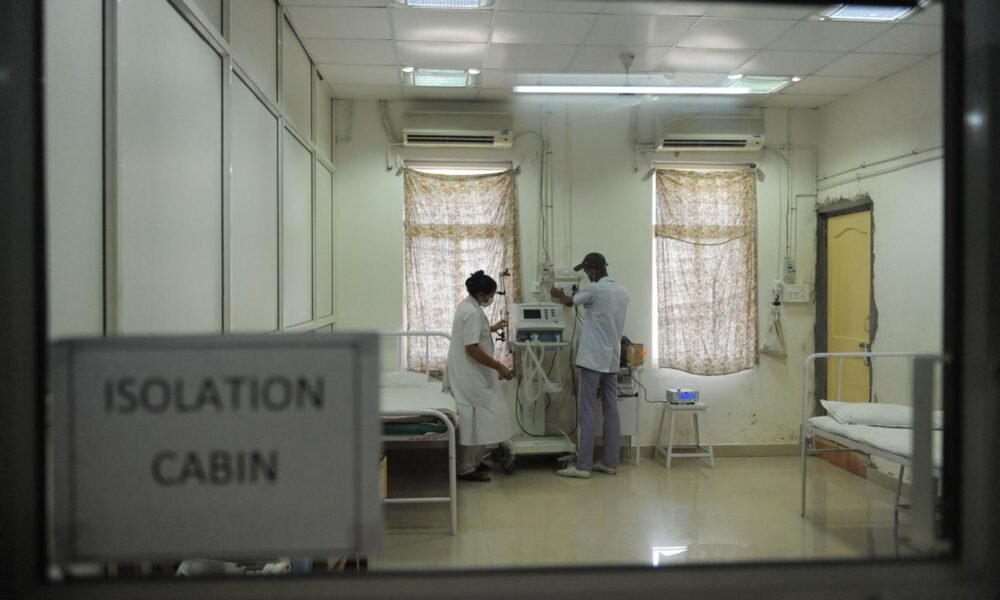 Security arrangements and healthcare operations inside an Indian hospital.