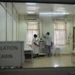 Security arrangements and healthcare operations inside an Indian hospital.