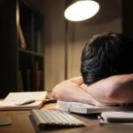 young adult using phone late night insomnia sleep deprivation india