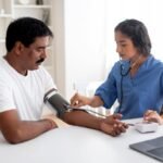 Doctor conducting preventive health screening and lifestyle disease awareness activities in India.