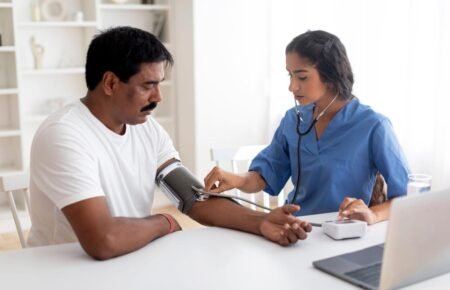 Doctor conducting preventive health screening and lifestyle disease awareness activities in India.