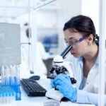 Scientists and healthcare professionals conducting laboratory testing and antimicrobial research.