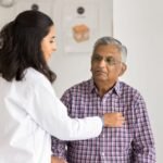 Cardiologist discussing heart health and preventive care with a patient.