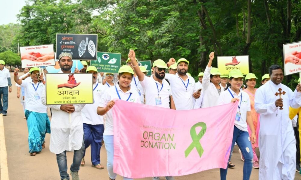 Healthcare professionals promoting organ donation awareness.