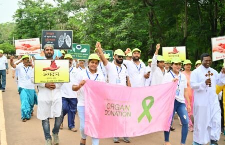 Healthcare professionals promoting organ donation awareness.