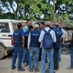 Health officials conducting disease surveillance and emergency response activities.