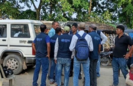 Health officials conducting disease surveillance and emergency response activities.