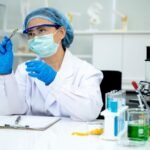 Quality inspection of medicines at a pharmaceutical manufacturing facility.