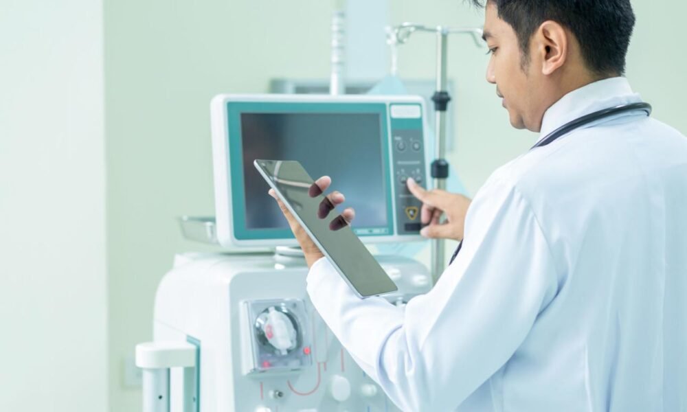 A patient undergoing dialysis treatment in a government hospital.