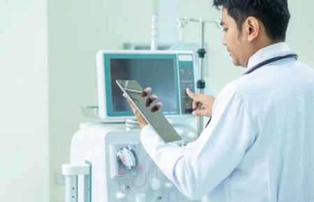 A patient undergoing dialysis treatment in a government hospital.