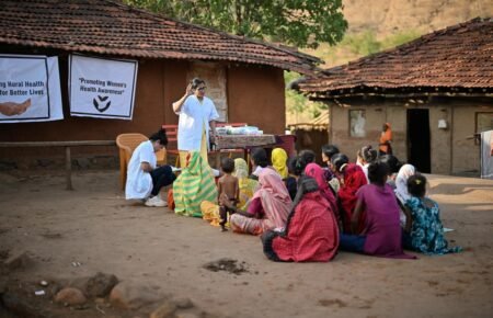 Health workers conducting awareness and disease prevention activities during the monsoon season.