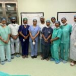 Doctors providing emergency healthcare support during a pilgrimage medical camp.