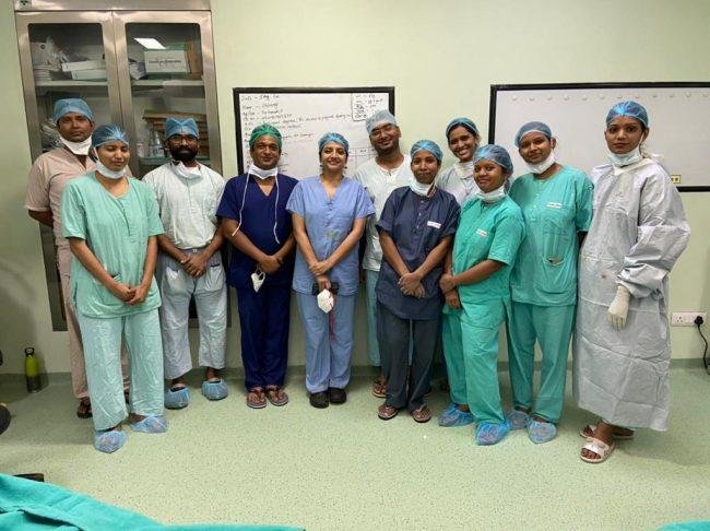 Doctors providing emergency healthcare support during a pilgrimage medical camp.