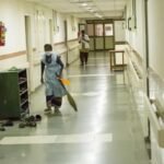 Hospital staff carrying out sanitation and disinfection in a government hospital.