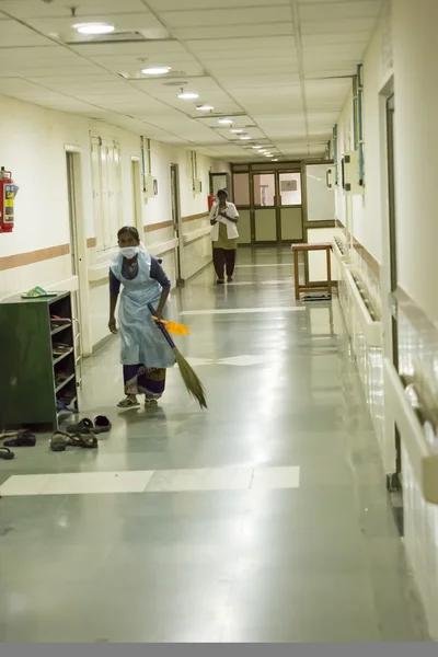Hospital staff carrying out sanitation and disinfection in a government hospital.