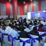 Healthcare professionals attending a medical conference focused on digital health and innovation.