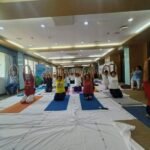 Doctors and healthcare professionals participating in a wellness and leadership programme.