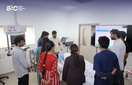Medical students receiving hands-on training using a patient simulation mannequin.
