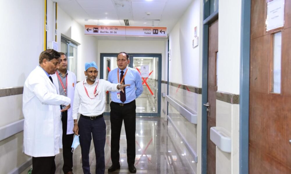 Engineers conducting a safety inspection inside a hospital building.