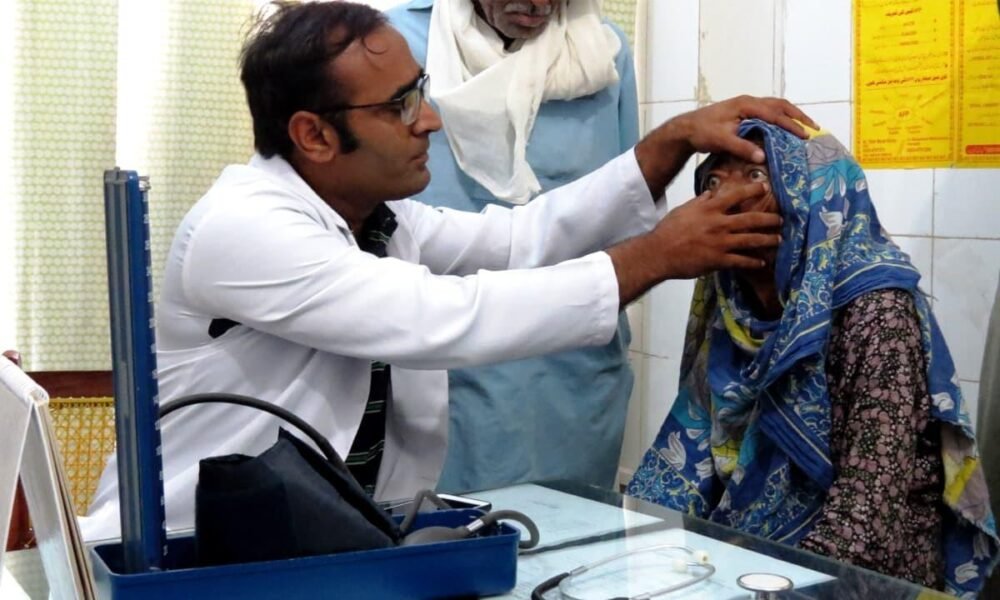 Doctors providing healthcare services at a government hospital under the National Health Mission.