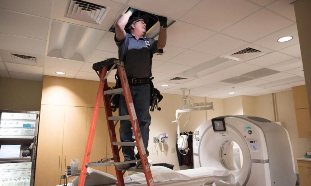 Engineers inspecting hospital infrastructure during a safety audit.