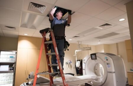 Engineers inspecting hospital infrastructure during a safety audit.
